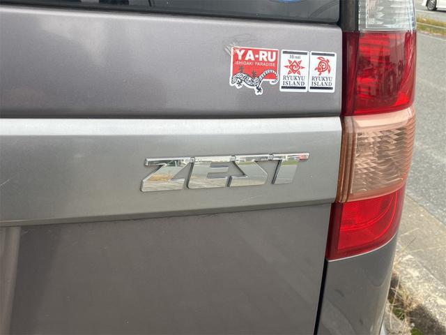 ゼスト スポーツWターボ HID キーレスエントリー 電動格納ミラー ベンチシート AT 盗難防止システム ABS CD ミュージックプレイヤー接続可 アルミホイール 衝突安全ボディ エアコン パワーステアリング(21枚目)