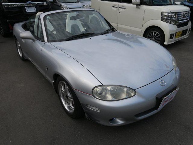 ロードスター ＳＰ　ＣＤ　ナルディステアリング　ＥＴＣ　社外１５インチアルミホイール　レザー調シートカバー　パワーウィンドウ　パワーステアリング（4枚目）