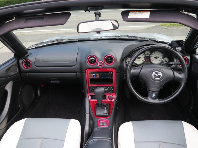 ロードスター ＳＰ　ＣＤ　ナルディステアリング　ＥＴＣ　社外１５インチアルミホイール　レザー調シートカバー　パワーウィンドウ　パワーステアリング（8枚目）