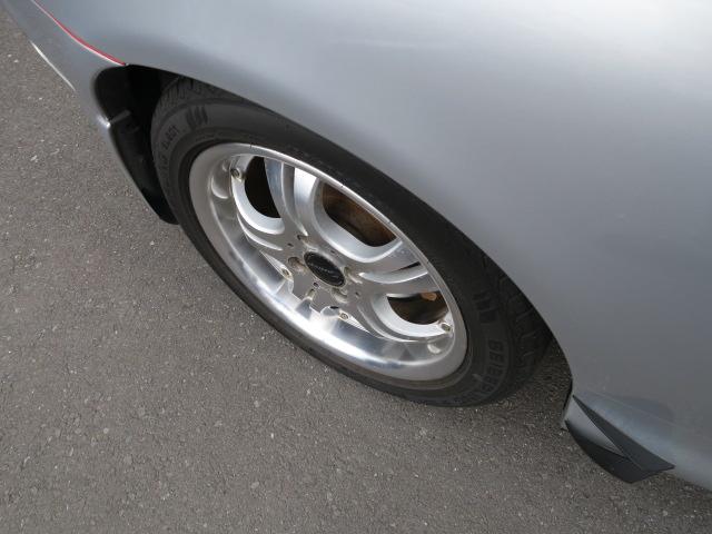 ロードスター ＳＰ　ＣＤ　ナルディステアリング　ＥＴＣ　社外１５インチアルミホイール　レザー調シートカバー　パワーウィンドウ　パワーステアリング（11枚目）