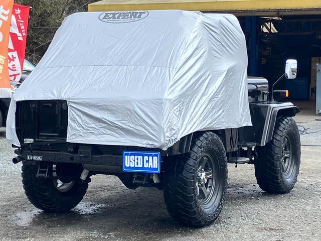 ジープ キャンバストップ　Ｊ５３型　４ＷＤ　４Ｆ　ディーゼルターボ　ホロ付　セミバケットシート　ＲＡＮＣＨＯ－ＲＳ５０００ショック　社外アルミホイール　社外ロールバー　オーバーフェンダー　フロントガード　フォグライト　サントップ付　車両シートカバー有　ＣＤ再生　ＵＳＢ（28枚目）