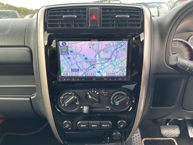 ジムニー ランドベンチャー　１０型ＡＴ　４ＷＤ　メモリーナビ　記録簿　レザーシート　シートヒーター　ドラレコ　フルセグＴＶ　ＥＴＣ　ＤＶＤ再生　ツイーター　けん引フック　ルーフキャリア　サイドガード　マッドガード　ターボ　革巻ハンドル　背面カバー　フォグ　電格ミラー（20枚目）