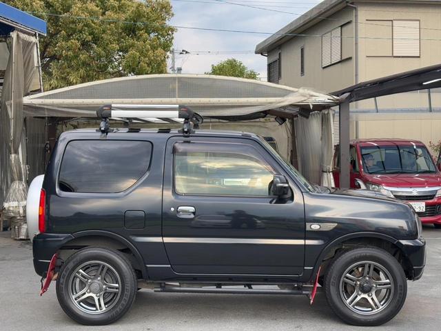 ジムニー ランドベンチャー　１０型ＡＴ　４ＷＤ　メモリーナビ　記録簿　レザーシート　シートヒーター　ドラレコ　フルセグＴＶ　ＥＴＣ　ＤＶＤ再生　ツイーター　けん引フック　ルーフキャリア　サイドガード　マッドガード　ターボ　革巻ハンドル　背面カバー　フォグ　電格ミラー（34枚目）