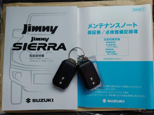 ジムニー ＸＣ　４ＷＤ　ＡＴ　メモリーナビ　／届出済未使用車　衝突軽減　新車保証書　クルコン　フルセグＴＶ　レーン逸脱警報　サイドガード　ルーフキャリア　リアラダー　マッドガード　　シートヒータ　ターボ　ＬＥＤヘッドライト　フォグ　オートライト　オートハイビーム　純正ＡＷ（23枚目）