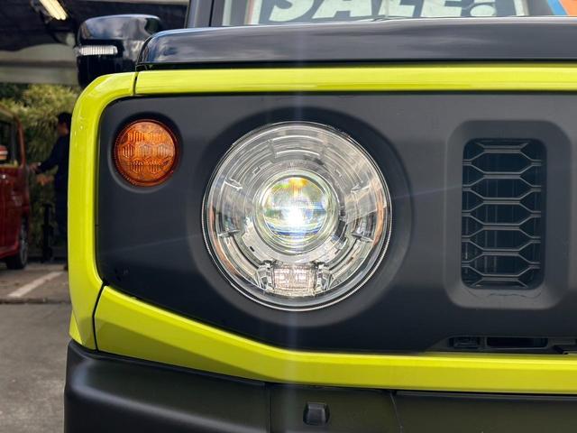 ジムニー ＸＣ　４ＷＤ　ＡＴ　メモリーナビ　／届出済未使用車　衝突軽減　新車保証書　クルコン　フルセグＴＶ　レーン逸脱警報　サイドガード　ルーフキャリア　リアラダー　マッドガード　　シートヒータ　ターボ　ＬＥＤヘッドライト　フォグ　オートライト　オートハイビーム　純正ＡＷ（27枚目）