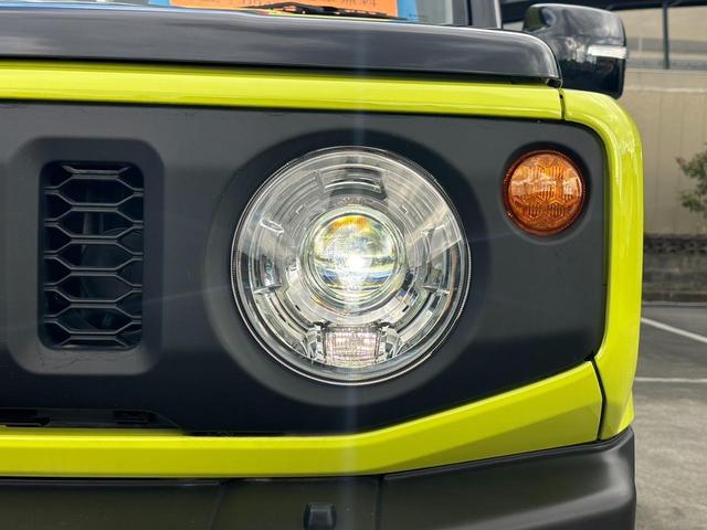 ジムニー ＸＣ　４ＷＤ　ＡＴ　メモリーナビ　／届出済未使用車　衝突軽減　新車保証書　クルコン　フルセグＴＶ　レーン逸脱警報　サイドガード　ルーフキャリア　リアラダー　マッドガード　　シートヒータ　ターボ　ＬＥＤヘッドライト　フォグ　オートライト　オートハイビーム　純正ＡＷ（28枚目）