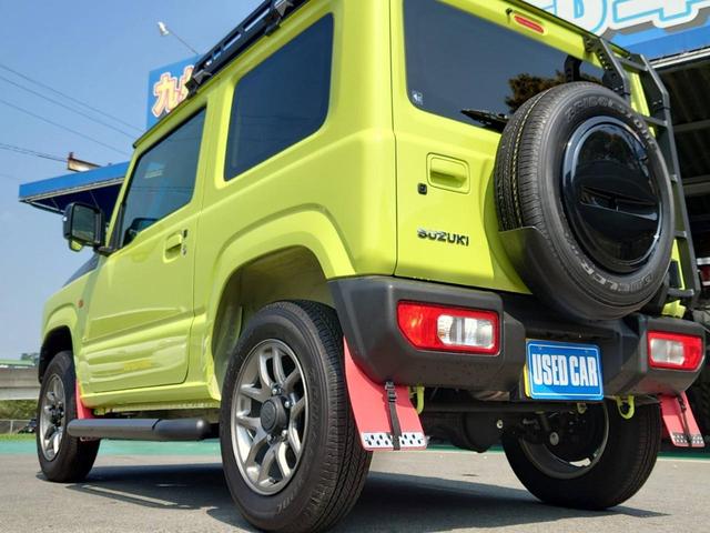 ジムニー ＸＣ　４ＷＤ　ＡＴ　メモリーナビ　／届出済未使用車　衝突軽減　新車保証書　クルコン　フルセグＴＶ　レーン逸脱警報　サイドガード　ルーフキャリア　リアラダー　マッドガード　　シートヒータ　ターボ　ＬＥＤヘッドライト　フォグ　オートライト　オートハイビーム　純正ＡＷ（46枚目）