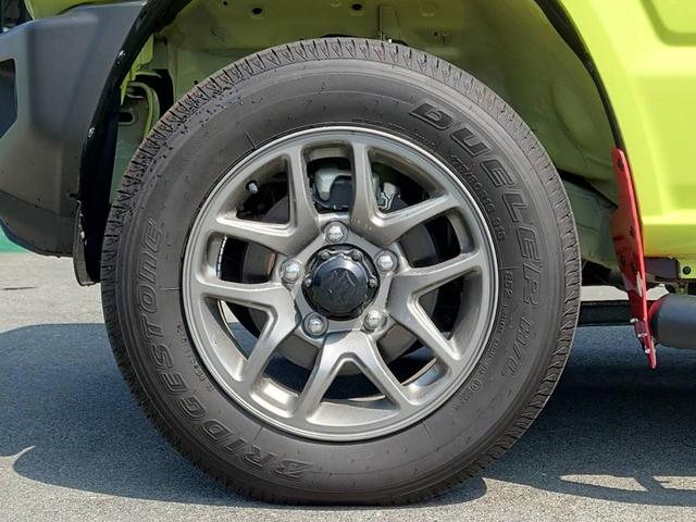 ジムニー ＸＣ　４ＷＤ　ＡＴ　メモリーナビ　／届出済未使用車　衝突軽減　新車保証書　クルコン　フルセグＴＶ　レーン逸脱警報　サイドガード　ルーフキャリア　リアラダー　マッドガード　　シートヒータ　ターボ　ＬＥＤヘッドライト　フォグ　オートライト　オートハイビーム　純正ＡＷ（50枚目）