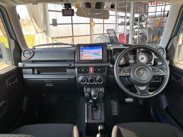 ジムニー ＸＣ　４ＷＤ　ＡＴ　ワンオーナー　／禁煙車　純正ナビ　記録簿　衝突軽減ブレーキ　レーン逸脱警報　前後ドラレコ　Ｂｌｕｅｔｏｏｔｈ　フルセグＴＶ　ＤＶＤ再生　バックカメラ　クルコン　シートヒーター　マッドガード　背面タイヤ　ＬＥＤヘッドライト　純正１６ＡＷ　ＥＴＣ（11枚目）