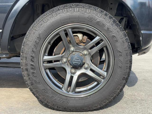 ジムニー ランドベンチャー４ＷＤ　１０型５ＭＴ　ＨＤＤナビ　新車保証書　フルセグＴＶ　ドラレコ　ＥＴＣ　ＤＶＤ再生　ＣＤ　レザーシート　フォグライト　ターボ　ドアバイザー　電格ミラー　キーレス　革巻ハンドル　フロアマット　光軸調整ライト　ＡＢＳ（53枚目）