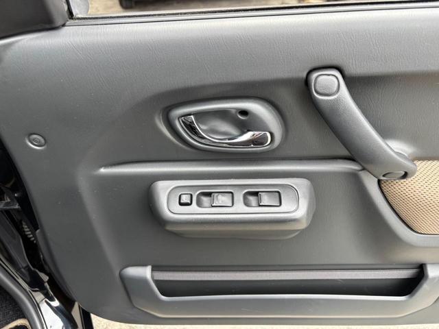 ジムニー ランドベンチャー　４ＷＤ　１０型ＡＴ　ＳＤナビ　フルセグＴＶ　記録簿　レザーシート　Ｂｌｕｅｔｏｏｔｈ　バックカメラ　ステリモ　シートヒーター　マッドガード　背面タイヤカバー　純正１６ＡＷ　ＨＩＤライト　フォグ　電格ミラー　革巻ハンドル　フロアマット　キーレス（69枚目）
