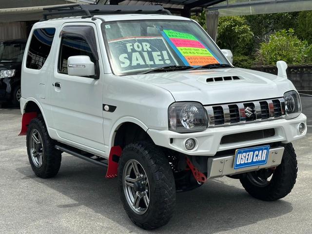 ジムニー ランドベンチャー　４ＷＤ　／１０型ＭＴ　車高調　リフトアップ　ＳＤナビ　ショートバンパー　社外マフラー　社外テール　ルーフキャリア　けん引フック　サイドガード　フルセグ　Ｂｌｕｅｔｏｏｔｈ　バックカメラ　ドラレコ　ＬＥＤライト　スコップ　マッドガード　フォグ（6枚目）