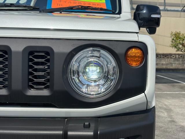 ジムニー ＸＣ　４ＷＤ　ＡＴ　届出済未使用車　衝突軽減ブレーキ　コーナーセンサー　レーン逸脱警報　クルーズコントロール　シートヒーター　ターボ　ＬＥＤヘッドライト　フォグ　純正１６ＡＷ　革巻ハンドル　スマートキー　電格ミラー　集中ドアロック　アイドリングストップ（26枚目）