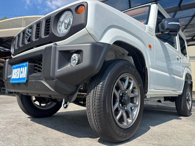 ジムニー ＸＣ　４ＷＤ　ＡＴ　届出済未使用車　衝突軽減ブレーキ　コーナーセンサー　レーン逸脱警報　クルーズコントロール　シートヒーター　ターボ　ＬＥＤヘッドライト　フォグ　純正１６ＡＷ　革巻ハンドル　スマートキー　電格ミラー　集中ドアロック　アイドリングストップ（31枚目）