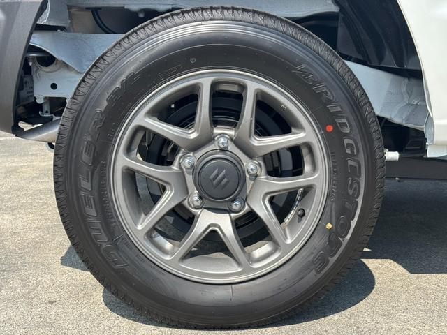 ジムニー ＸＣ　４ＷＤ　ＡＴ　届出済未使用車　衝突軽減ブレーキ　コーナーセンサー　レーン逸脱警報　クルーズコントロール　シートヒーター　ターボ　ＬＥＤヘッドライト　フォグ　純正１６ＡＷ　革巻ハンドル　スマートキー　電格ミラー　集中ドアロック　アイドリングストップ（47枚目）