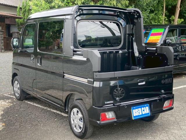 ハイゼットカーゴ デッキバンＧ　届出済未使用車　メモリーナビ／　衝突軽減装置　新車保証書　コーナーセンサー　ＴＶ　スマートキ　アイドリングストップ　レーン逸脱警報　オートライト　両側スライドドア　プッシュスタート　４人乗　頭上荷物入れ　集中ドアロック　電格ミラー　光軸調整ライト（8枚目）