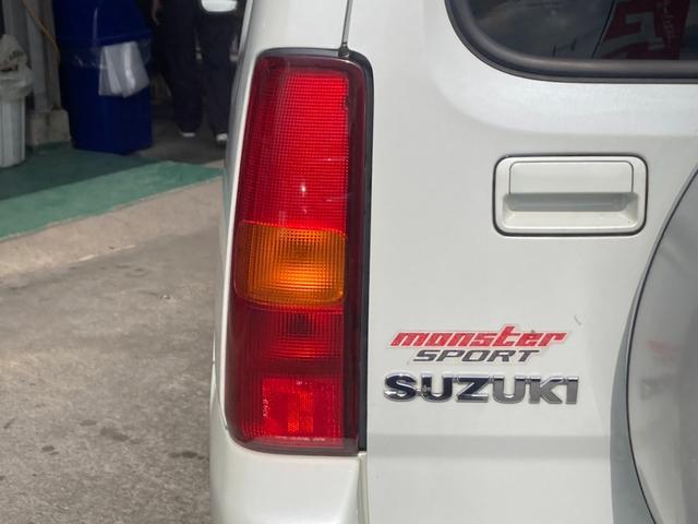 ジムニー ランドベンチャー４ＷＤ　１０型５ＭＴ／ＳＤナビ　リフトアップ　Ｂｌｕｅｔｏｏｔｈ　記録簿　社外マフラー　フルセグＴＶ　シートヒーター　キーレス　ステリモ　ターボ　電格ミラー　レザーシート　純正１６ＡＷ　ＥＴＣ　ＤＶＤ　革巻ハンドル　電格ミラー　背面タイヤカバー（42枚目）