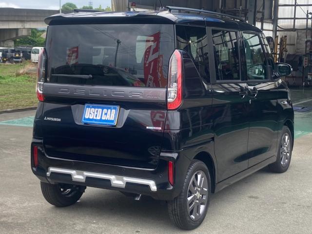 デリカミニ Ｔ　プレミアム　４ＷＤ　届出済未使用車　メモリーナビ　ターボ　両側Ｐドア　衝突軽減装置　新車保証書　コーナーセンサー　レーン逸脱警報　フルセグＴＶ　クルコン　ステアリングヒータ　全方位カメラ　ハーフレザーシート　電動Ｐブレーキ　シートヒータ　パドルシフト（6枚目）