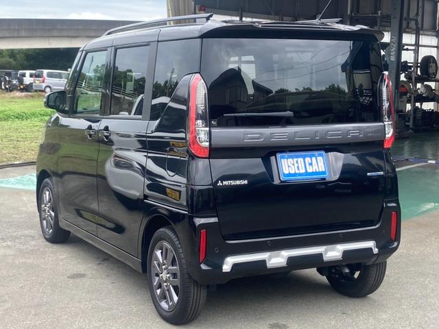 デリカミニ Ｔ　プレミアム　４ＷＤ　届出済未使用車　メモリーナビ　ターボ　両側Ｐドア　衝突軽減装置　新車保証書　コーナーセンサー　レーン逸脱警報　フルセグＴＶ　クルコン　ステアリングヒータ　全方位カメラ　ハーフレザーシート　電動Ｐブレーキ　シートヒータ　パドルシフト（8枚目）