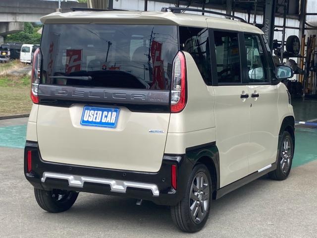 デリカミニ Ｇ　プレミアム　届出済未使用車　メモリーナビ　両側パワードア　衝突軽減装置　コーナーセンサー　レーン逸脱警報　全方位カメラ　クルーズコントロール　ＴＶ　ハーフレザーシート　シートヒーター　電動Ｐブレーキ　ルーフレール　純正１５ＡＷ　ＬＥＤライト　オートハイビーム（6枚目）