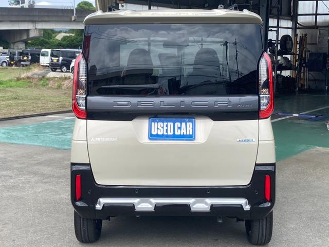 デリカミニ Ｇ　プレミアム　届出済未使用車　メモリーナビ　両側パワードア　衝突軽減装置　コーナーセンサー　レーン逸脱警報　全方位カメラ　クルーズコントロール　ＴＶ　ハーフレザーシート　シートヒーター　電動Ｐブレーキ　ルーフレール　純正１５ＡＷ　ＬＥＤライト　オートハイビーム（7枚目）
