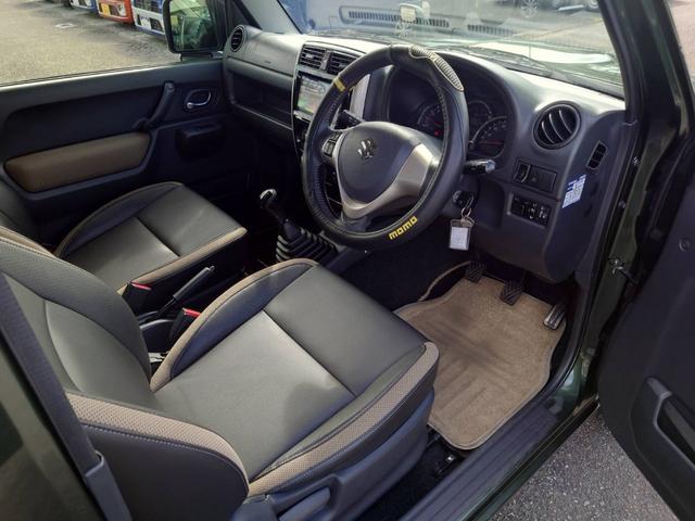 ジムニー ランドベンチャー　４ＷＤ　１０型５ＭＴ　ＳＤナビ　フルセグ　Ｂｌｕｅｔｏｏｔｈ　ＥＴＣ　記録簿　キーレス　ＤＶＤ再生　シートヒーター　ステリモ　ターボ　電格ミラー　フォグライト　革巻ハンドル　ドアバイザー　純正１６ＡＷ　背面タイヤカバー　光軸調整ライト（12枚目）