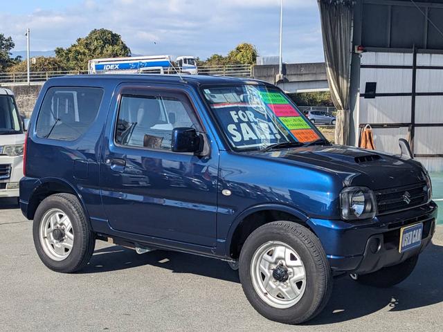 ジムニー ＸＧ　４ＷＤ　１０型ＡＴ　ワンオーナー　背面タイヤ　キーレス　ターボ　ドアバイザー　フェンダーミラー　ミラーヒーター　光軸調整ライト　集中ドアロック　エアコン　パワステ　パワーウィンドウ（5枚目）