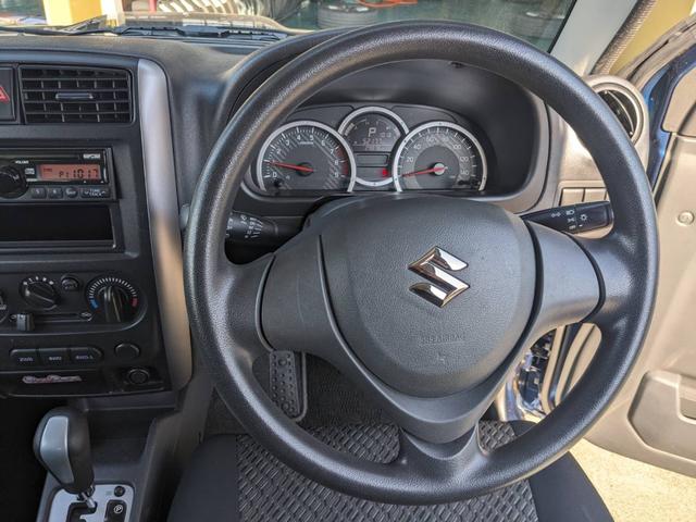 ジムニー ＸＧ　４ＷＤ　１０型ＡＴ　ワンオーナー　背面タイヤ　キーレス　ターボ　ドアバイザー　フェンダーミラー　ミラーヒーター　光軸調整ライト　集中ドアロック　エアコン　パワステ　パワーウィンドウ（12枚目）