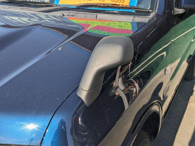 ジムニー ＸＧ　４ＷＤ　１０型ＡＴ　ワンオーナー　背面タイヤ　キーレス　ターボ　ドアバイザー　フェンダーミラー　ミラーヒーター　光軸調整ライト　集中ドアロック　エアコン　パワステ　パワーウィンドウ（30枚目）