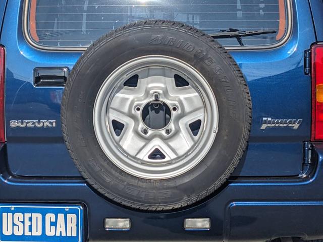 ジムニー ＸＧ　４ＷＤ　１０型ＡＴ　ワンオーナー　背面タイヤ　キーレス　ターボ　ドアバイザー　フェンダーミラー　ミラーヒーター　光軸調整ライト　集中ドアロック　エアコン　パワステ　パワーウィンドウ（38枚目）