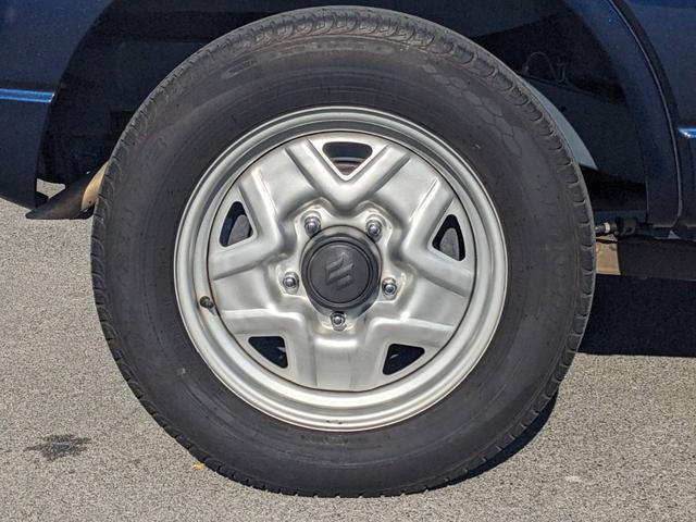 ジムニー ＸＧ　４ＷＤ　１０型ＡＴ　ワンオーナー　背面タイヤ　キーレス　ターボ　ドアバイザー　フェンダーミラー　ミラーヒーター　光軸調整ライト　集中ドアロック　エアコン　パワステ　パワーウィンドウ（47枚目）