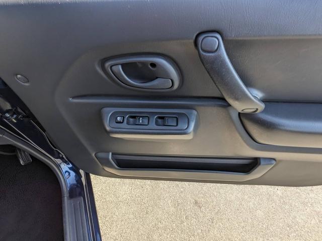 ジムニー ＸＧ　４ＷＤ　１０型ＡＴ　ワンオーナー　背面タイヤ　キーレス　ターボ　ドアバイザー　フェンダーミラー　ミラーヒーター　光軸調整ライト　集中ドアロック　エアコン　パワステ　パワーウィンドウ（63枚目）