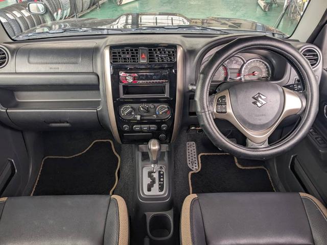 ジムニー ランドベンチャー　４ＷＤ　１０型ＡＴ　レザーシート　シートヒーター　フォグライト　ＥＴＣ　キーレス　電格ミラー　革巻ハンドル　ターボ　ドアバイザー　背面タイヤカバー　ミラーヒーター　フェンダーミラー　光軸調整ライト　純正１５ＡＷ　エアバック（10枚目）