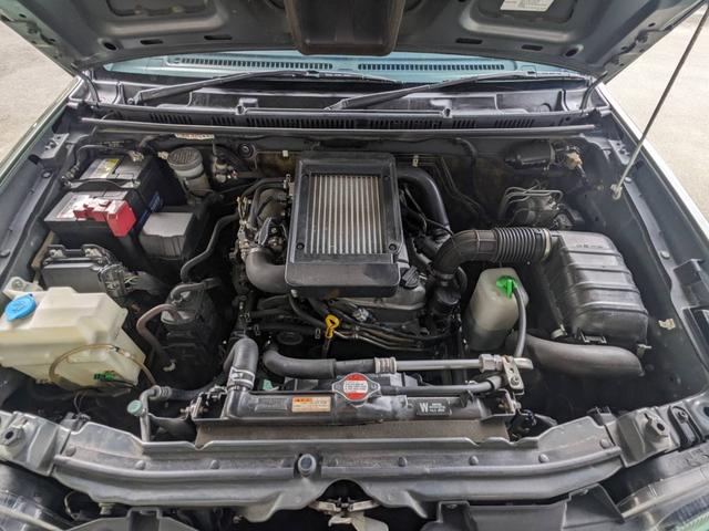 ジムニー ランドベンチャー　４ＷＤ　１０型ＡＴ　レザーシート　シートヒーター　フォグライト　ＥＴＣ　キーレス　電格ミラー　革巻ハンドル　ターボ　ドアバイザー　背面タイヤカバー　ミラーヒーター　フェンダーミラー　光軸調整ライト　純正１５ＡＷ　エアバック（23枚目）