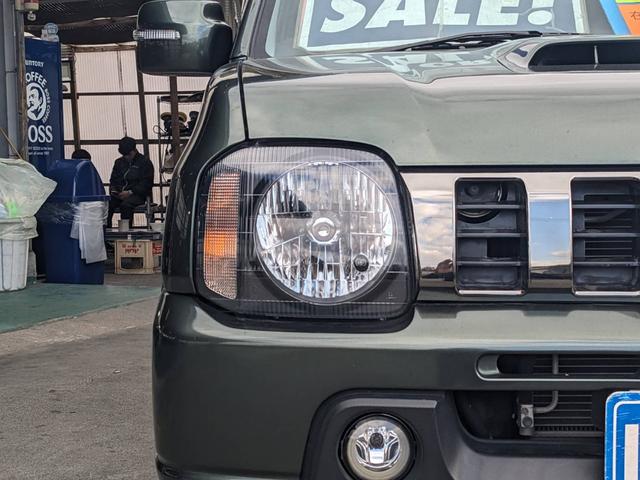 ジムニー ランドベンチャー　４ＷＤ　１０型ＡＴ　レザーシート　シートヒーター　フォグライト　ＥＴＣ　キーレス　電格ミラー　革巻ハンドル　ターボ　ドアバイザー　背面タイヤカバー　ミラーヒーター　フェンダーミラー　光軸調整ライト　純正１５ＡＷ　エアバック（28枚目）