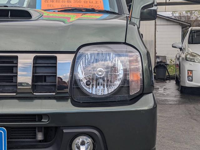 ジムニー ランドベンチャー　４ＷＤ　１０型ＡＴ　レザーシート　シートヒーター　フォグライト　ＥＴＣ　キーレス　電格ミラー　革巻ハンドル　ターボ　ドアバイザー　背面タイヤカバー　ミラーヒーター　フェンダーミラー　光軸調整ライト　純正１５ＡＷ　エアバック（29枚目）