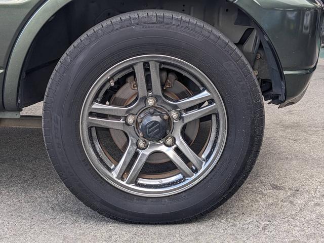 ジムニー ランドベンチャー　４ＷＤ　１０型ＡＴ　レザーシート　シートヒーター　フォグライト　ＥＴＣ　キーレス　電格ミラー　革巻ハンドル　ターボ　ドアバイザー　背面タイヤカバー　ミラーヒーター　フェンダーミラー　光軸調整ライト　純正１５ＡＷ　エアバック（49枚目）