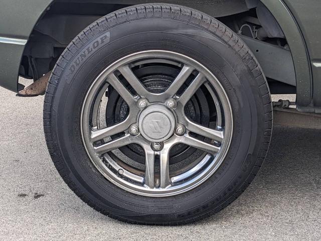 ジムニー ランドベンチャー　４ＷＤ　１０型ＡＴ　レザーシート　シートヒーター　フォグライト　ＥＴＣ　キーレス　電格ミラー　革巻ハンドル　ターボ　ドアバイザー　背面タイヤカバー　ミラーヒーター　フェンダーミラー　光軸調整ライト　純正１５ＡＷ　エアバック（50枚目）