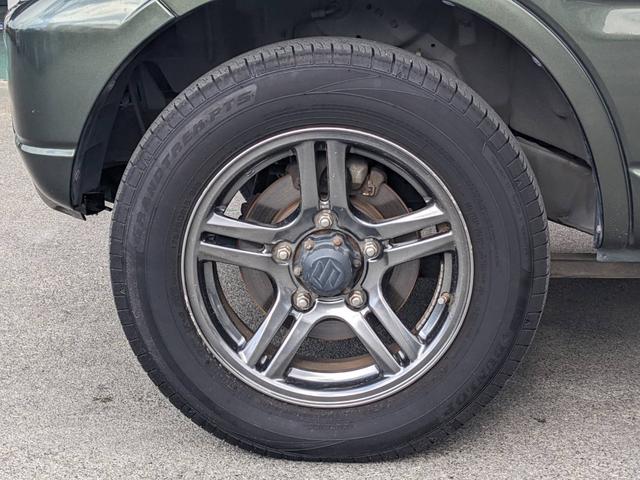 ジムニー ランドベンチャー　４ＷＤ　１０型ＡＴ　レザーシート　シートヒーター　フォグライト　ＥＴＣ　キーレス　電格ミラー　革巻ハンドル　ターボ　ドアバイザー　背面タイヤカバー　ミラーヒーター　フェンダーミラー　光軸調整ライト　純正１５ＡＷ　エアバック（51枚目）