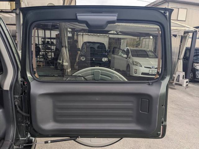 ジムニー ランドベンチャー　４ＷＤ　１０型ＡＴ　レザーシート　シートヒーター　フォグライト　ＥＴＣ　キーレス　電格ミラー　革巻ハンドル　ターボ　ドアバイザー　背面タイヤカバー　ミラーヒーター　フェンダーミラー　光軸調整ライト　純正１５ＡＷ　エアバック（53枚目）