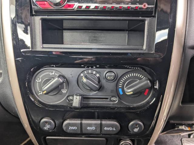 ジムニー ランドベンチャー　４ＷＤ　１０型ＡＴ　レザーシート　シートヒーター　フォグライト　ＥＴＣ　キーレス　電格ミラー　革巻ハンドル　ターボ　ドアバイザー　背面タイヤカバー　ミラーヒーター　フェンダーミラー　光軸調整ライト　純正１５ＡＷ　エアバック（58枚目）