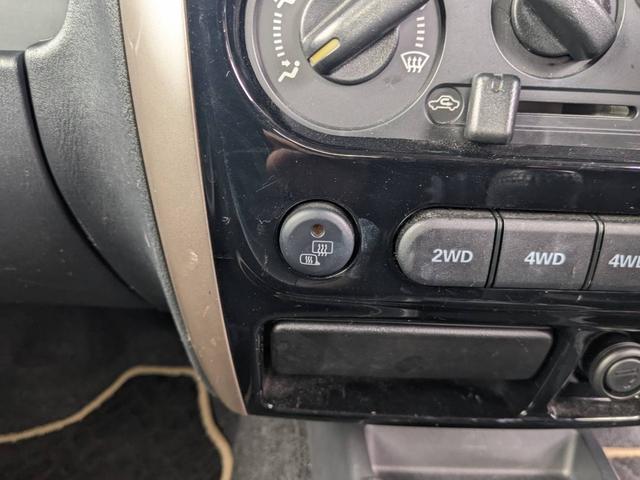 ジムニー ランドベンチャー　４ＷＤ　１０型ＡＴ　レザーシート　シートヒーター　フォグライト　ＥＴＣ　キーレス　電格ミラー　革巻ハンドル　ターボ　ドアバイザー　背面タイヤカバー　ミラーヒーター　フェンダーミラー　光軸調整ライト　純正１５ＡＷ　エアバック（59枚目）