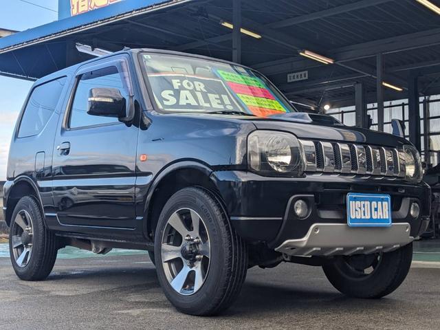 ジムニー クロスアドベンチャーＸＣ　４ＷＤ　８型５ＭＴ　ＳＤナビ　ＨＫＳ社外マフラー　ハーフレザーシート　シートヒーター　革巻ハンドル　背面タイヤカバー　純正１６ＡＷ　フォグライト　キーレス　ターボ　パワーウィンドウ　ミラーヒーター　電格ミラー　光軸調整ライト（33枚目）