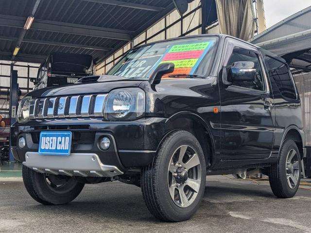 ジムニー クロスアドベンチャーＸＣ　４ＷＤ　８型５ＭＴ　ＳＤナビ　ＨＫＳ社外マフラー　ハーフレザーシート　シートヒーター　革巻ハンドル　背面タイヤカバー　純正１６ＡＷ　フォグライト　キーレス　ターボ　パワーウィンドウ　ミラーヒーター　電格ミラー　光軸調整ライト（34枚目）