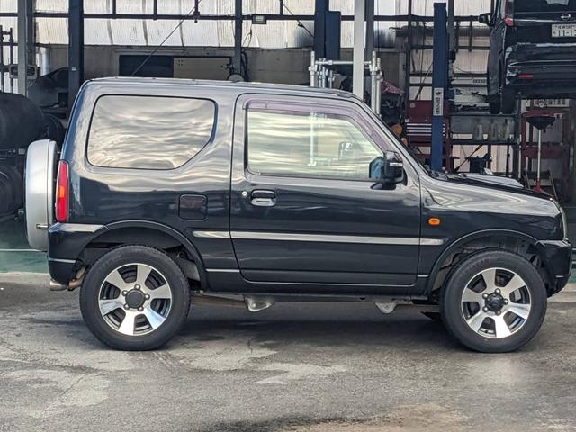 ジムニー クロスアドベンチャーＸＣ　４ＷＤ　８型５ＭＴ　ＳＤナビ　ＨＫＳ社外マフラー　ハーフレザーシート　シートヒーター　革巻ハンドル　背面タイヤカバー　純正１６ＡＷ　フォグライト　キーレス　ターボ　パワーウィンドウ　ミラーヒーター　電格ミラー　光軸調整ライト（35枚目）