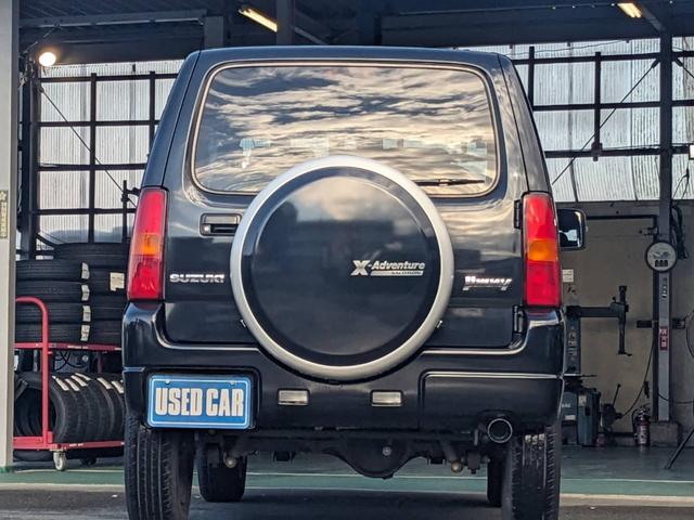 ジムニー クロスアドベンチャーＸＣ　４ＷＤ　８型５ＭＴ　ＳＤナビ　ＨＫＳ社外マフラー　ハーフレザーシート　シートヒーター　革巻ハンドル　背面タイヤカバー　純正１６ＡＷ　フォグライト　キーレス　ターボ　パワーウィンドウ　ミラーヒーター　電格ミラー　光軸調整ライト（39枚目）
