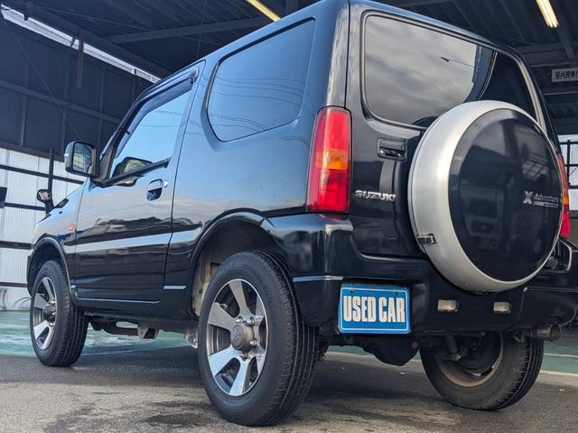 ジムニー クロスアドベンチャーＸＣ　４ＷＤ　８型５ＭＴ　ＳＤナビ　ＨＫＳ社外マフラー　ハーフレザーシート　シートヒーター　革巻ハンドル　背面タイヤカバー　純正１６ＡＷ　フォグライト　キーレス　ターボ　パワーウィンドウ　ミラーヒーター　電格ミラー　光軸調整ライト（45枚目）