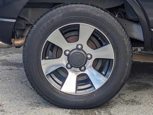 ジムニー クロスアドベンチャーＸＣ　４ＷＤ　８型５ＭＴ　ＳＤナビ　ＨＫＳ社外マフラー　ハーフレザーシート　シートヒーター　革巻ハンドル　背面タイヤカバー　純正１６ＡＷ　フォグライト　キーレス　ターボ　パワーウィンドウ　ミラーヒーター　電格ミラー　光軸調整ライト（48枚目）