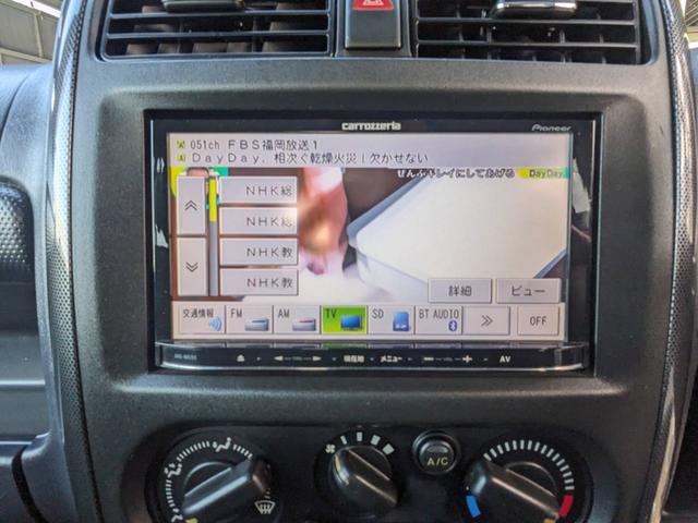 ジムニー クロスアドベンチャーＸＣ　４ＷＤ　８型５ＭＴ　ＳＤナビ　ＨＫＳ社外マフラー　ハーフレザーシート　シートヒーター　革巻ハンドル　背面タイヤカバー　純正１６ＡＷ　フォグライト　キーレス　ターボ　パワーウィンドウ　ミラーヒーター　電格ミラー　光軸調整ライト（53枚目）