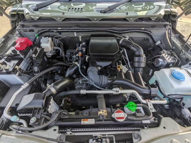 ジムニー XC 4WD 5MT SDナビ 衝突軽減ブレーキ Bluetooth フルセグTV ドラレコ ルーフキャリア ETC クルーズコントロール レーン逸脱警報 シートヒーター LEDヘッドライト リアマッドフラップ オートライト ターボ 背面タイヤカバー(22枚目)